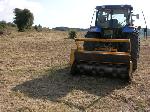 Treballs de recuperació de conreus amb tractor agrícola. Febrer 2008