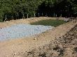 Construcció d’estany de llacunatge per a la depuració d’aigües al Torrent de Vallforners. Juliol 2012